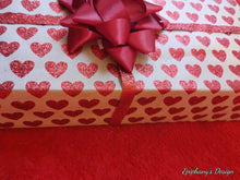 Load image into Gallery viewer, GIFT WRAP PAPER: BROWN WITH RED SPARKLY HEARTS
