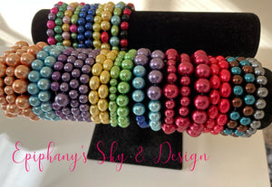 BRACELETS: Shiny, pearl-beaded bracelets