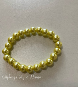 BRACELETS: Shiny, pearl-beaded bracelets