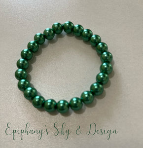 BRACELETS: Shiny, pearl-beaded bracelets