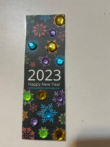 Bookmarks with sequins and/or rhinestones